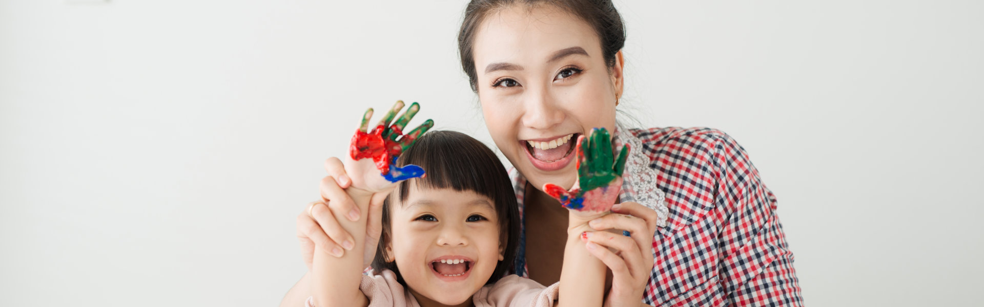 smiling kids and adult woman
