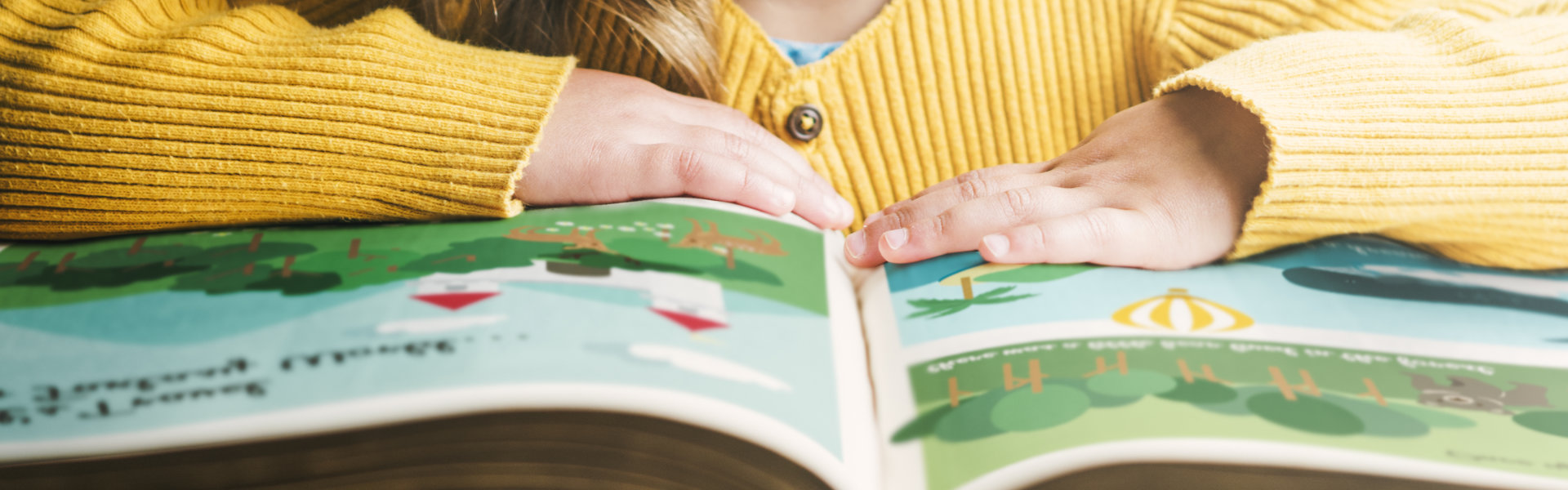 kid reading book